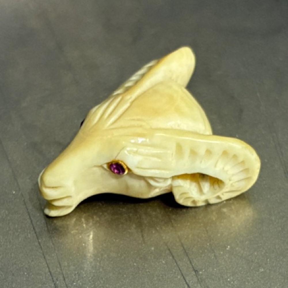 18K gold vintage Ram’s head pendant.